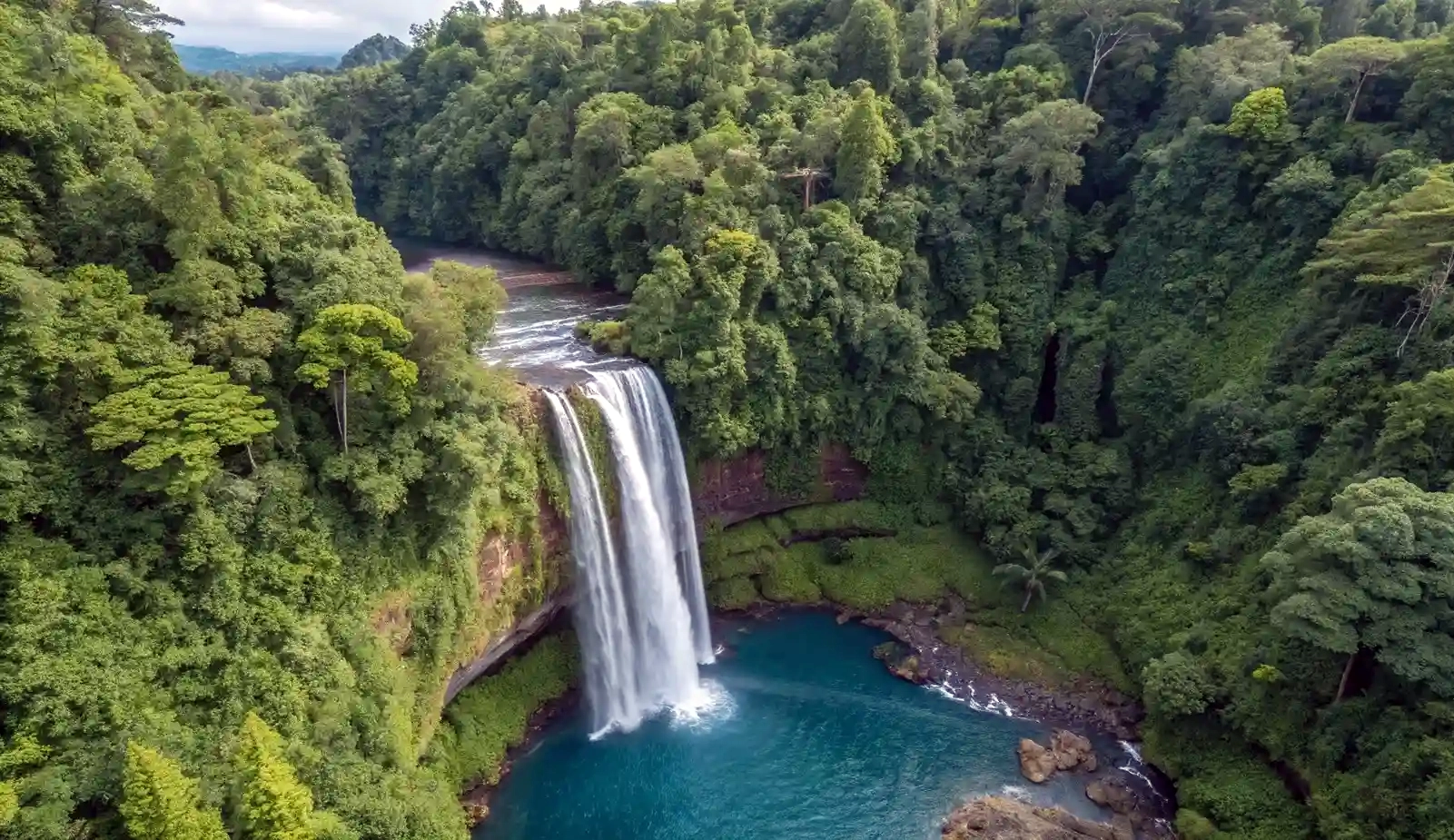 Keindahan Alam Air Terjun Kandera yang Menawan di Papua